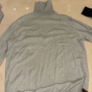 Men’s turtle neck size L. Brand rumours